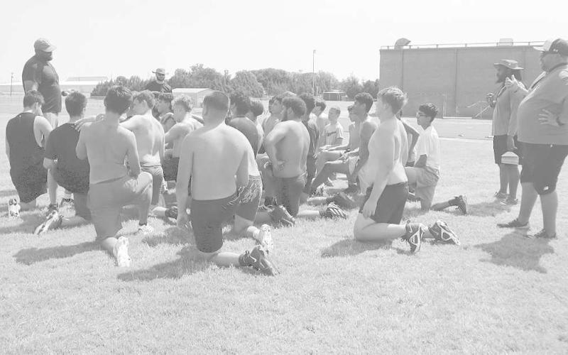 TAKE A KNEE - Levelland ISD is holding summer workouts for the athletes that play football and the incoming freshman to get a feel for high school athletics. (Staff Photo by Aalijah Soliz)