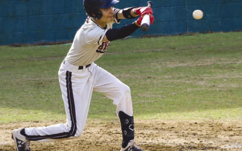 BUNT - Levelland Lobo Charlie Romo bunted the ball to get to first base during the team’s game against the Sweetwater Mustangs this past Wednesday as the visiting team. (Staff photo by Aalijah Soliz)