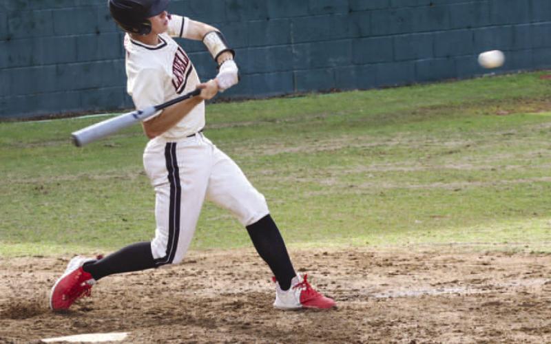 MOONSHOT - Levelland Lobo Anson McMahan hit the ball during the team’s game against the Sweetwater Mustangs this past Wednesday for UIL district play. (Staff photo by Aalijah Soliz)