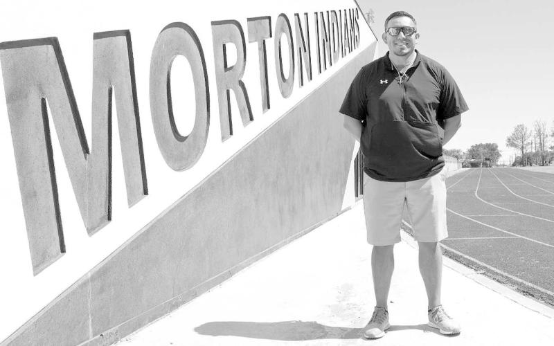 BIG MOVES - Morton ISD has hired new Girls Basketball Head Coach, Eric Velasquez to take over the program. Pictured above is Eric Velasquez in front of the Field House nect to Indean Stadiam. (Staff Photo by Aalijah Soliz)