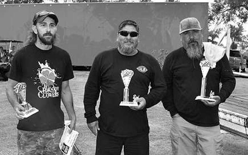 CUSTOM MOTORCYCLE– Thunder on the Plains held its annual Car Show Saturday in City Park with a good turn out despite the rain. Pictured are the winners in the Custom Motorcycle category: Mike Guerrero, first place, 2003 Big Dog K9 chopper; Osiel Sanchez, second place, 2006 Honda 600; and Brandon Parent, third place, 2010 Harley Electra Glide. (Staff Photo)