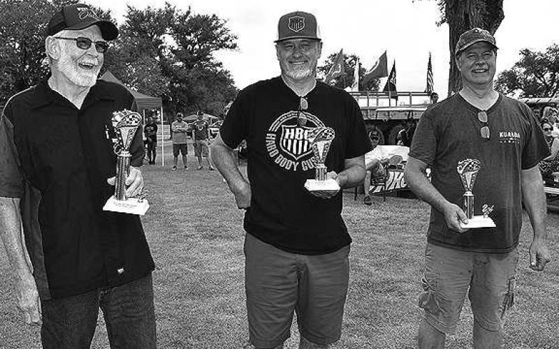 ORIGINAL CARS– Many participants showed up and showed off their classics, hot rods and rat rods for the annual Thunder on the Plains events were held this weekend. Pictured are the winners in the Original Cars category: first place winner David Bolden, 1947 Plymouth Special Deluxe; second place, Mark Mitchell, 61 Chevy Corvette; and third place, Kelly Gaskins, 1964 Chevy Impala SS. (Staff Photo)