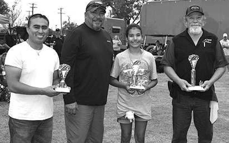 PROJECTS IN PROGRESS-- Thunder on the Plains held it annual Car Show Saturday, despite the rain, many showed up and showed off their hot rods and rat rods. Pictured are the winners in the Projects in Progress category: Ricky Taylor, first place, 1946 Willy’s Jeep Ratrod; Enoc Ramirez, second place, 1947 International Fleetstar; and Rosendo Alcaraz, third place, 1983 Oldsmobile Cutlass. (Staff Photo)