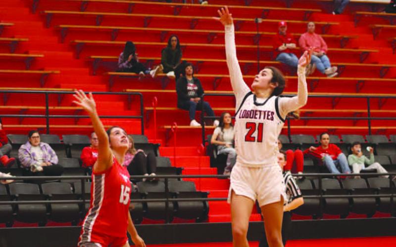 EASY SHOT - Levelland Loboette Carly Tienda made the shot over the Denver City Fillie to get the team some much needed points in the teams win. (Staff photo by Aalijah Soliz)