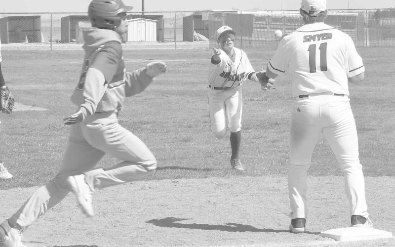 ALL DISTRICT INFIELDER- Austin Martinez made the 4-3 play to Ben Steele to get a Tahoka runner out at first in a 5-4 Smyer Bobcat home win over Tahoka in UIL District 4-2A High School Baseball action early in the season. Martinez made the all-district first team as an infielder while Steele was selected as first team utility. (Photo Courtesy of Jay Kelley)