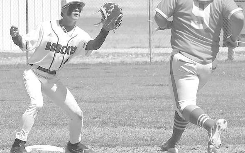 DEFENSIVE MVP- Smyer shortstop Aiden Martinez got ready to tag Sundown’s Jeffrey Rodrigues in a 7-6 Smyer home win in UIL District 4-2A high school baseball action earlier this season. Martinez was selected as most valuable defensive player on the all-district team.(Photo Courtesy of Jay Kelley)