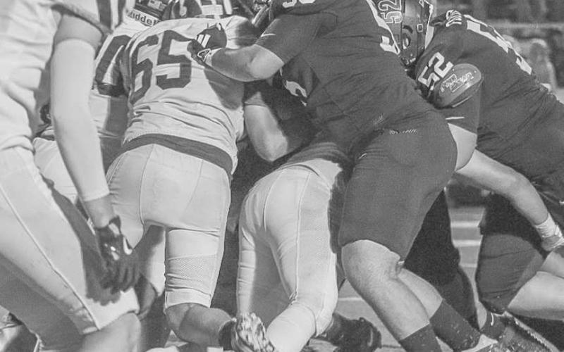 DOMINANT - Levelland Lobo Matt Romero held up his defender in the trenches this past Friday against the Snyder Tigers at home. (Staff photo by Aalijah Soliz)