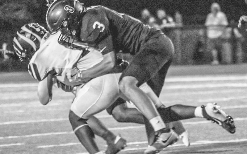 DOWN YOU GO - Levelland Lobo Gage Potter brought down the Snyder ballcarrier this past Friday at home in the team’s last non-district game. (Staff photo by Aalijah Soliz)