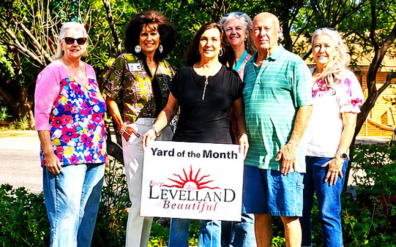 Levelland Chamber of Commerce August Yard of the Month. Brodie and Carolyn Hutchinson at 101 Holly Circle. Shown are Donna Wheeler, Cristal Isaacks, Kori McNeal, Ann Capps. Front row: Brodie and Carolyn Hutchinson.