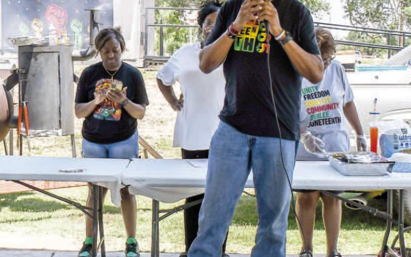 ENTREPRENEURSHIP - Business owner Mark Rutledge spoke at the 35th annual Juneteenth Celebration event this past Saturday. This year’s theme was “Still So Much Work To Do.” Ruthledge spoke to the crowd offering tips on how to become an entrepreneur in the current economy. (Staff photo by Essence Childers)