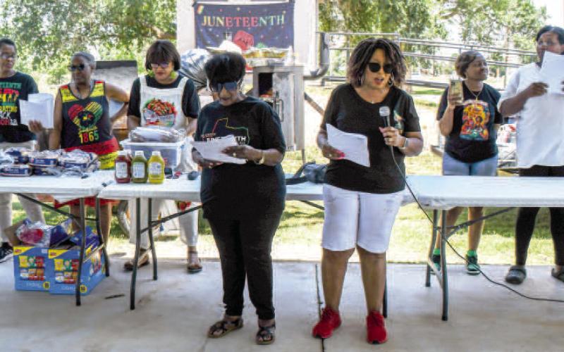 LOTTERY BASKET WINNER - Juneteenth Committee members announced winners of the lottery baskets this Saturday at the annual Juneteenth Celebration. Community members purchased tickets with a chance of winning lottery prizes up to $250. Pictured in no particular order are: Juneteenth Committee members Mary Leaks, Alma Rutledge, Mylinda Graves, Debra Franklin, Glenda Jones, Joyce Howard and Tina Williams. (Staff photo by Essence Childers)