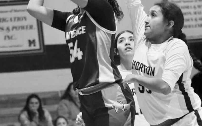 CONTESTED SHOT - Tymmyah Olenga had 12 points to help the Whiteface Lady Lopes to a 70-10 road win over Morton in the opening game of the UIL District 2A-5 girls’ basketball season. Olenga and the Lady Lopes will host Seagraves on Monday at 7 p.m. (Photo by Holly Crutcher)