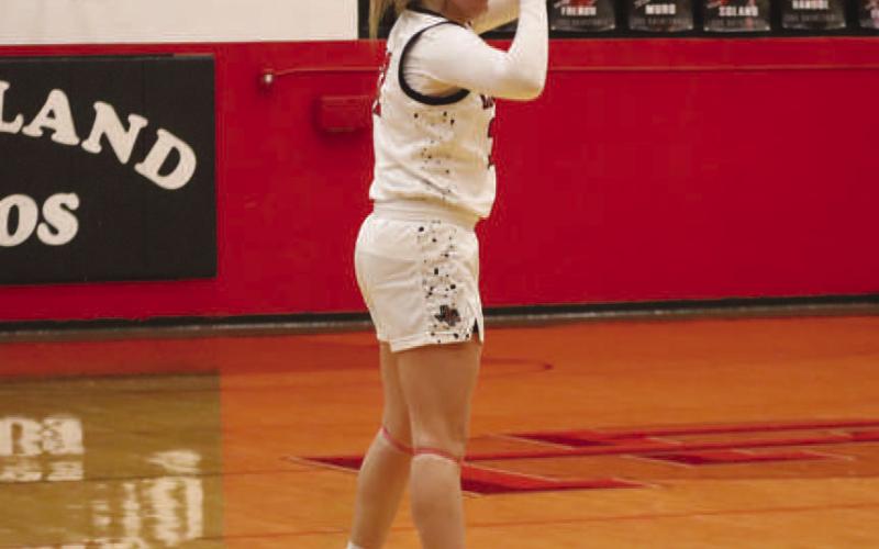 THREE - Levelland Loboette Emery Smith shot the ball from behind the arch during the team’s win against the Estacado Lady Mats at home this past Tuesday. (Staff photo by Aalijah Soliz)