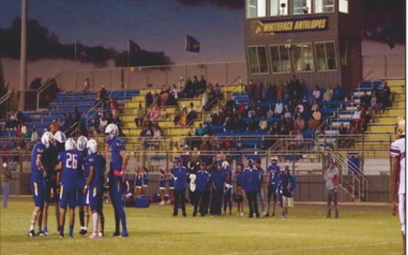 HUDDLE UP - The Whiteface Antelopes football team huddles up on the field during their game against Meadow this past Friday night at Antelope Stadium. Whiteface would end up winning 56-0. (Photo provided by Whiteface Victory Line Facebook)