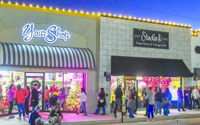 MAIN STREET – Ladies Night Out attendees shopped, ate and socialized at the Main Street event held Thursday night in downtown Levelland. Stores were decorated inside and out for the seasonal event. (Staff photo by Evin Thomas)