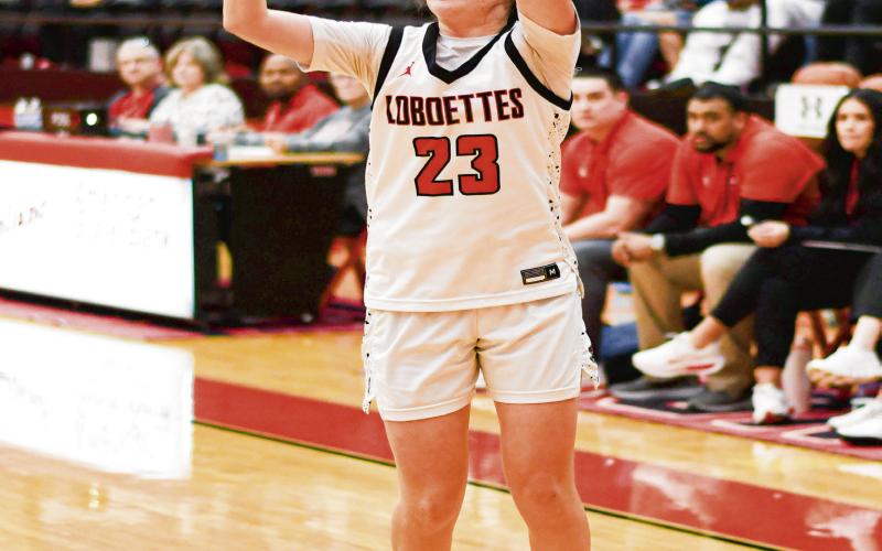 ESCOBAR FOR THREE - Levelland Loboette Brooklyn Escobar shoots a three-pointer during their game against Big Spring this past Tuesday at Levelland High School. Escobar would score 10 points in the win. (Staff photo by Jentezen Smith)
