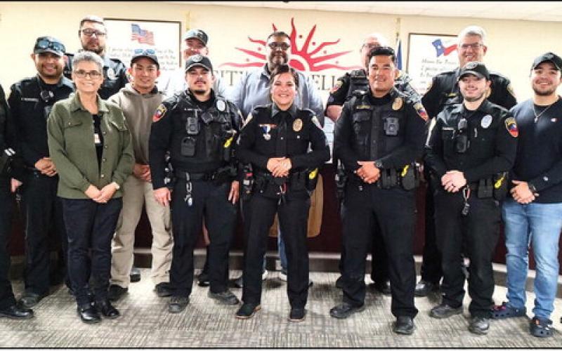 LPD Chief Erica O’Bryon announced the promotion of Sgt. Chapi Baeza at the recent city council meeting. She was joined by family and law enforcement as her father, Ismael Baeza, pinned the new badge on the officer who has been with LPD since 2019 and is currently the narcotics K-9 handler. (Staff photo)