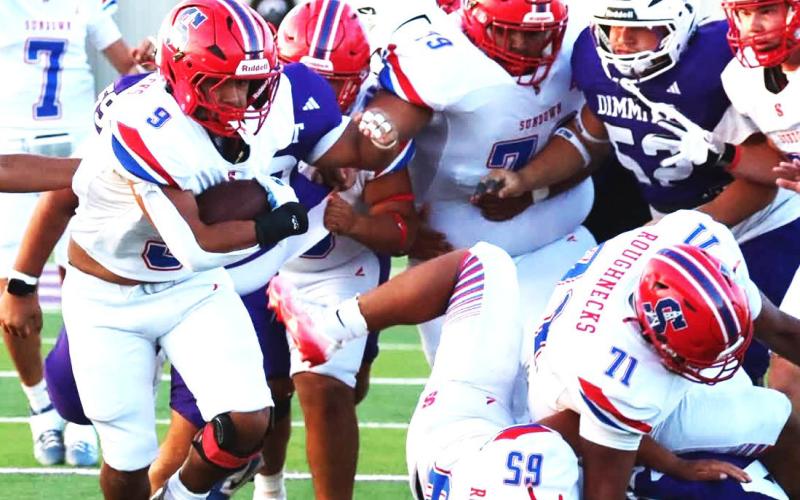 Sundown Roughnecks try to gain yardage on a carry against Dimmitt. (Sundown ISD photo)