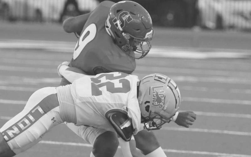 TOO STRONG - Sundown Roughneck Brayson Frey broke a tackle last Friday night during the team’s homecoming game against the New Deal Lions at home. (Photo courtesy of Sundown ISD)