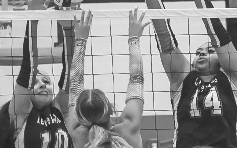BLOCK PARTY - Levelland Loboettes Mia Morin and Trinity Wafers got vertical during their game against the Littlefield Lady Cats this past Tuesday at home. (Staff photo by Aalijah Soliz)