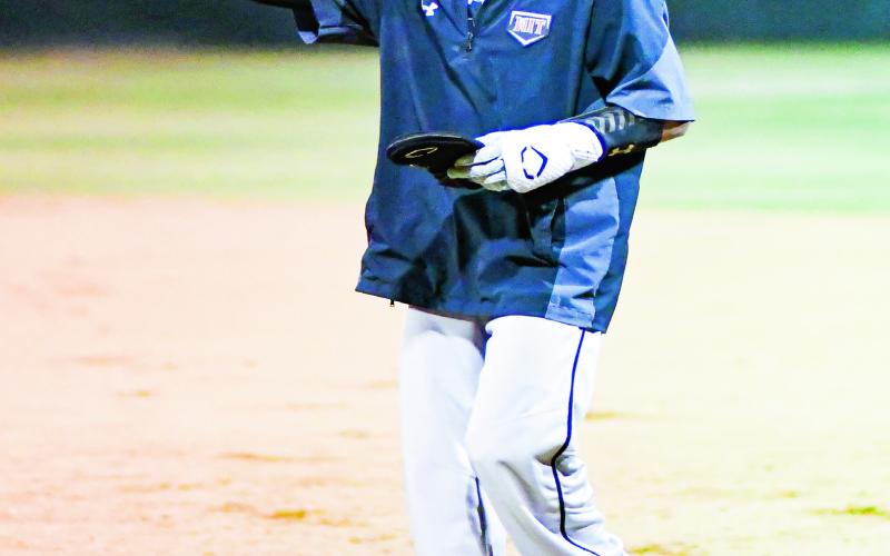 POST HIT CELEBRATION - Levelland Lobo Javier Ruiz signals to the dugout with a post hit celebration following hitting a single during their scrimmage against Seminole this past Friday at Levelland High School. (Staff photo by Jentezen Smith)
