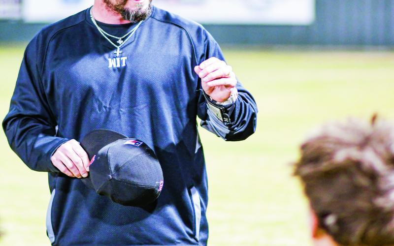 POSTGAME TAKEAWAYS - Levelland Lobos Head Baseball Coach Chris Portwood addresses the team following their scrimmage against Seminole this past Friday night at Levelland High School. (Staff photo by Jentezen Smith)