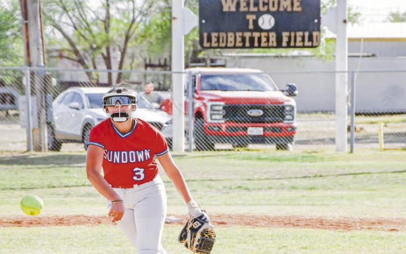 FEELING PERFECT - Sundown Roughette Destiny Garza delivers a pitch during their district softball against Morton this past Tuesday night at Ledbetter Field. Garza would toss a perfect game allowing zero runs, hits and walks while striking out seven batters. (Staff photo by Jentezen Smith)