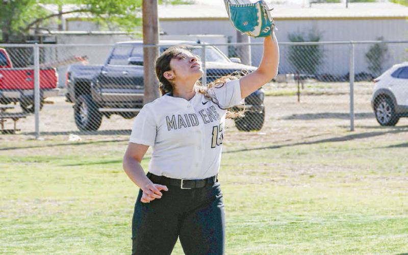 ROUTINE POP OUT - Morton Maiden Ada Torres fields the out on a routine pop out during their district softball game against Sundown this past Tuesday night at Ledbetter field. (Staff photo by Jentezen Smith)