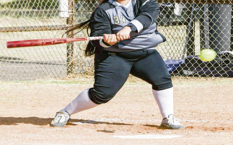 SQUARE ONE UP - Morton Maiden Amaris Zapata looks to square a pitch up with her bat during their district softball game against Sundown this past Tuesday night at Ledbetter field. (Staff photo by Jentezen Smith)