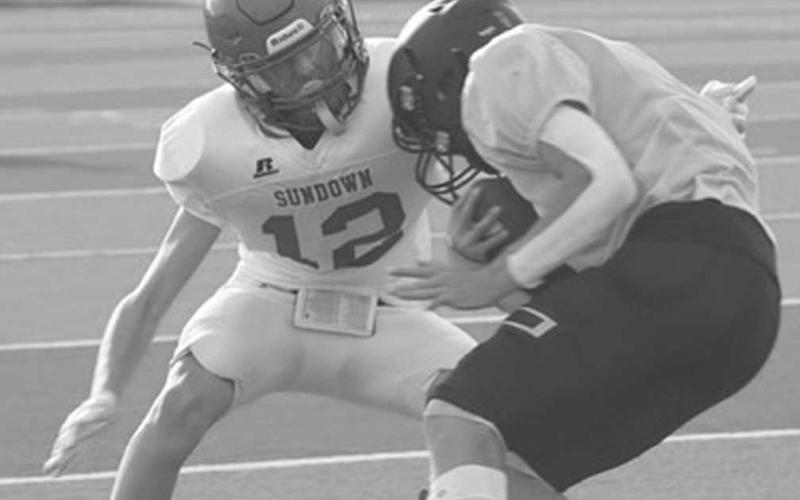 GOOD STOP - Sundown Roughneck Nathan Flores broke down and made the good tackle on the Sudan ballcarrier this past Friday on the road before their first game on Thursday in Canyon. (Photo courtesy of Sundown ISD)