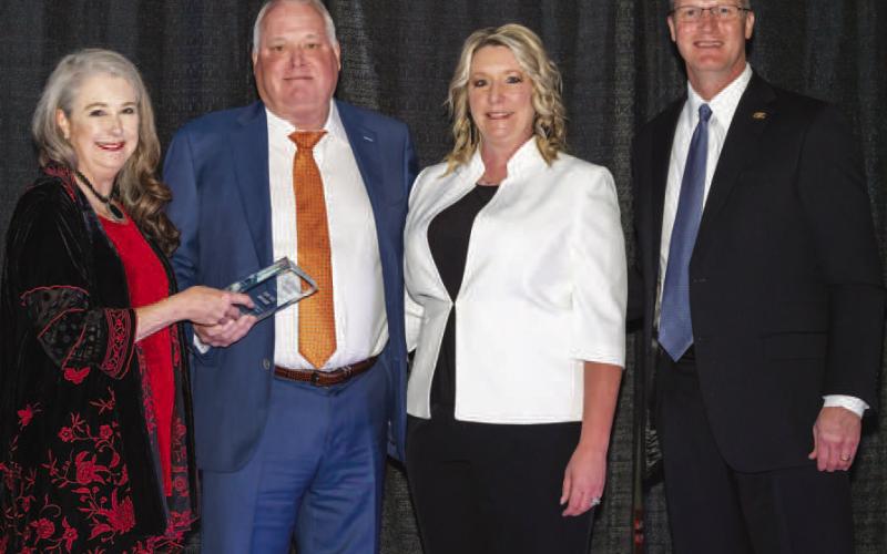 2023 PACESETTER AWARD – South Plains College Foundation President Ann Capps, left, presents the Pacesetter Award to Joe Dee Brooks, 2023 Pacesetter honoree. Also shown are Melanie Brooks and Dr. Robin Satterwhite, South Plains College President. The award was presented during the college’s 25th Annual Scholarship Gala held Feb. 24 at the Mallet Event Center. (Photo by B and P Photography)
