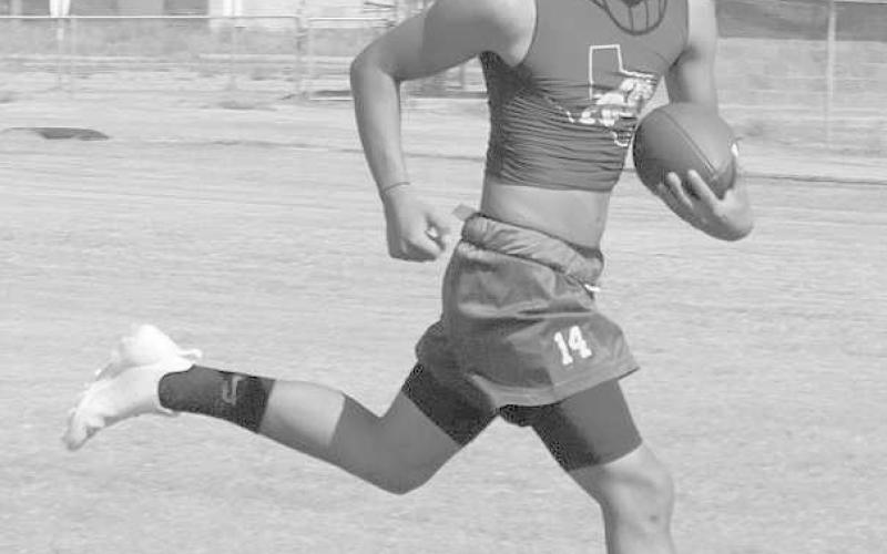 HIT THE HOLE - During two-a-days practice Anton athlete Gavin Martinez hit the gap between his o-line during team drills. (Staff photo by Aalijah Soliz)
