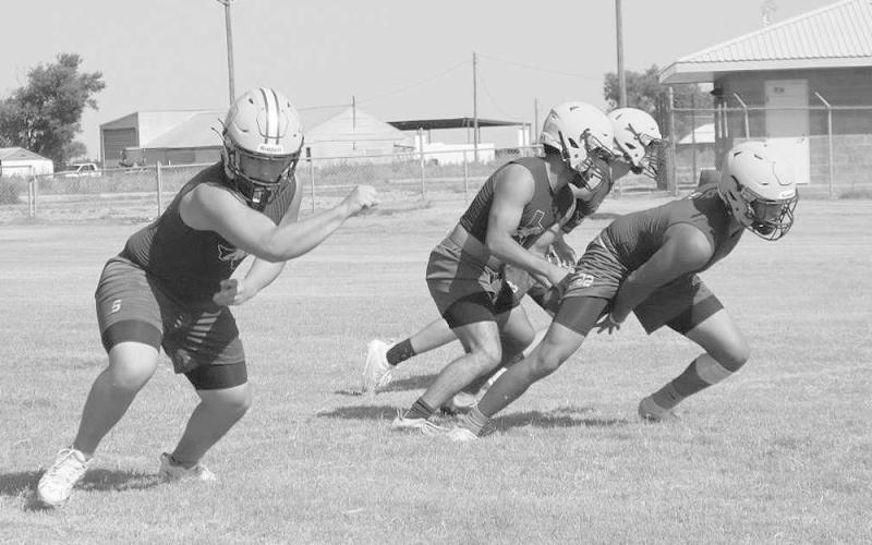 PERFECT BLOCKING - The Anton offense took the field during the first day of two-a-days on Monday to work on plays they will run this season and get some conditioning in to perfect their team. (Staff photo by Aalijah Soliz)