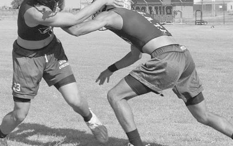SWIM MOVE - Anton athletes Autilano Castillo and Adrian Castillo were competing during one-on-one drills. (Staff photo by Aalijah Soliz)