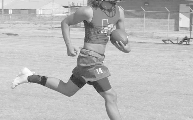 HIT THE HOLE - Anton athlete Gavin Martinez hit the hole his offensive line created during Anton’s twoa- days practice. (Staff photo by Aalijah Soliz)