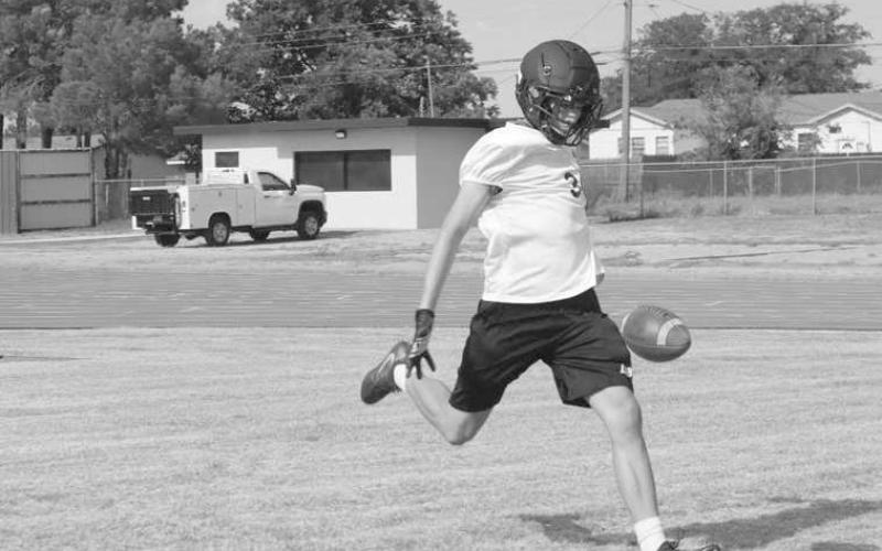 BOOMING PUNT - Levelland punter Gage French booted the ball downfield during special teams unit at Levelland’s two-a-days practice. (Staff photo by Aalijah Soliz)