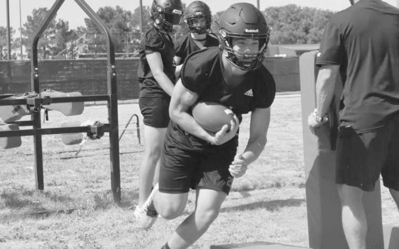 QUICK CUTS - Levelland athlete Austin Ellis was getting shifty during Levelland’s two-a-days pracitce. (Staff photo by Aalijah Soliz)
