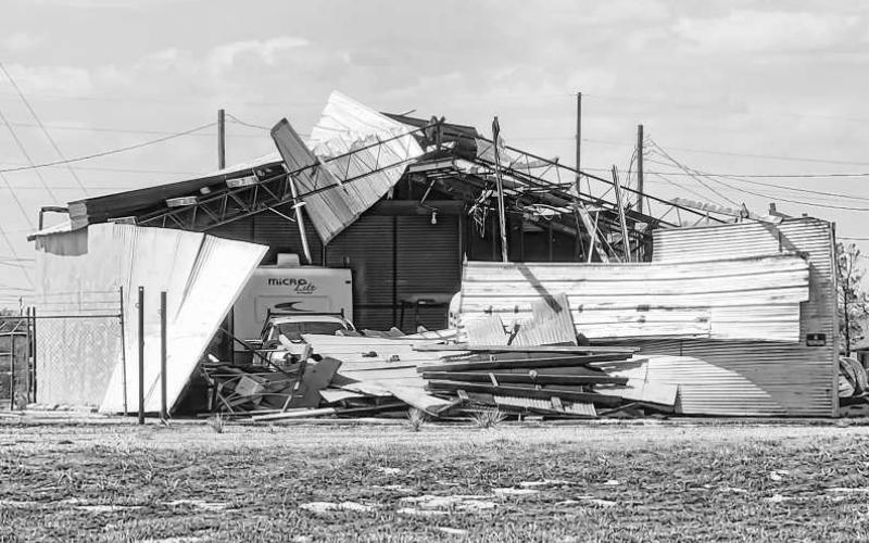 AFTERMATH – Many residents within Levelland will be figuring out their next steps following Wednesday’s storm as damages to homes, businesses and property were immense. Pictured is a building along W. Highway 114 that suffered extreme damages due to the storm’s high winds. (Staff photo by Dom Puente)