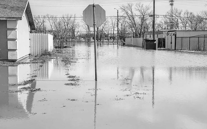 INTENSE FLOODING – Along with the large hail and extreme winds, flash flooding was a result of Wednesday’s storm. With the heavy amount of rainfall received, various areas of Levelland were flooded and even roads were closed as a result of the immense amount of rain. Pictured is the area surrounding Maple Street flooded following the storm. (Staff photo by Dom Puente)