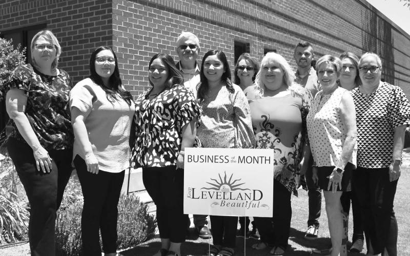 BUSINESS OF THE MONTH - Business of the Month was awarded to Prosperity Bank by Keep Levelland Beautiful. Names in no particular order: Gabrielle Gonzalez, Tammy Franklin, Russell Riley, Priscilla Corrales, Denis Trull, Samantha Davila, Mary Siders, Josh Meredith, Barbara Pinner, Janie Morales and Stephanie Rodriguez. (Staff photo by Victoria Byrnes)
