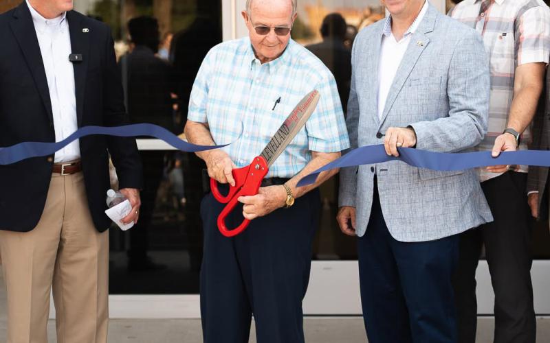 South Plains College Board of Regents Chairman Mike Box was joined by SPC President Robin Satterwhite, board of directors, city administration and businesses to cut the ribbon on new Aquatic Center.