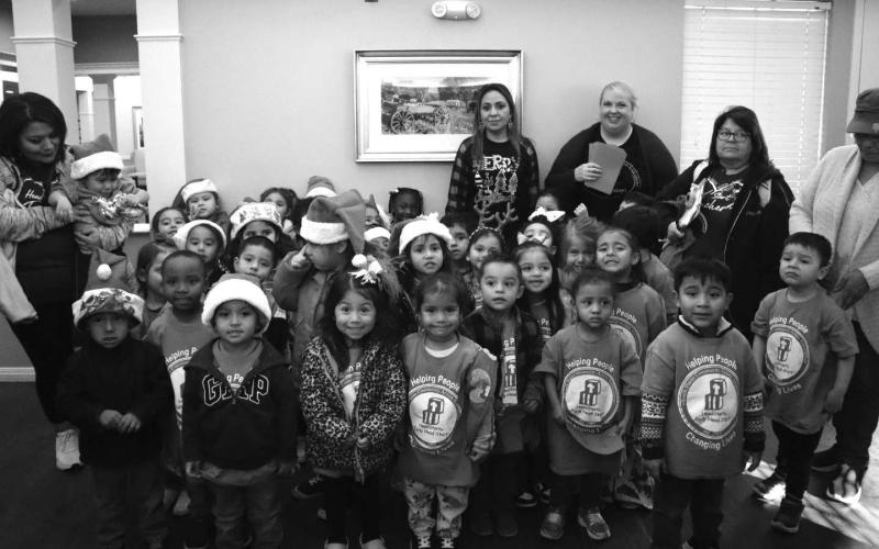 CHRISTMAS CAROLING- The Three-year-old classes from Levelland ABC went Christmas Caroling this past Tuesday for the residents at Hickory Place. Residents and the children’s family members were entertained by the Christmas songs the children had been practicing for weeks. After the children sang, they handed out handmade Christmas cards to show the residents how appreciative they were for allowing them to come out and sing for them. (Staff photo by Aalijah Soliz)