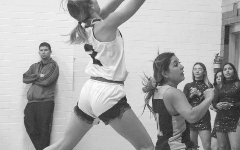 FASTBREAK - Whitharral Lady Panther Madi Chavez ran down the court on a fastbreak to lay the ball up over Morton defender Aerie Rodriguez this past Tuesday. (Staff photo by Aalijah Soliz)