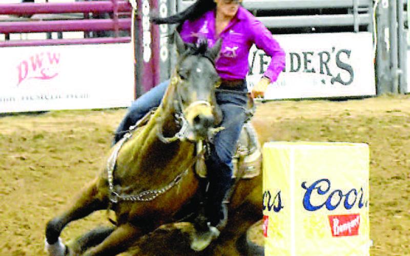 BARRELL RACING-- The ABC Pro Rodeo returned to the Mallet Event Center &amp;amp; Arena this past weekend, bringing three days of high-energy entertainment and professional rodeo competition to the community. (Staff photo)