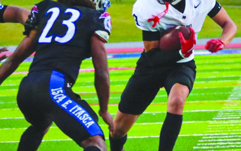 ELUSIVE - Levelland Lobo Kysen Niblett ran behind his blocker on the screen pass October 10th against the Estacado Matadors on the road. (Staff photo by Aalijah Soliz)