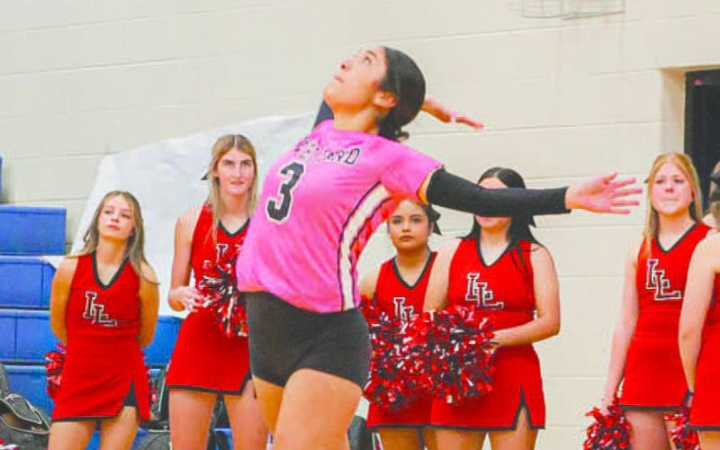 SERVE - Levelland Loboette Gabby Pesqueda served the ball during her team’s game against the San Angelo Lake View Maidens last Tuesday on the road. (Staff photo by Aalijah Soliz)