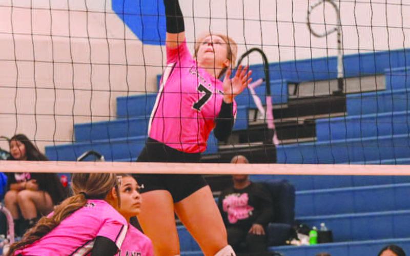 KILL - Levelland Loboette Addisen Campbell sent her shot over the net last Tuesday night against the San Angelo Lake View Maidens in district play. (Staff photo by Aalijah Soliz)
