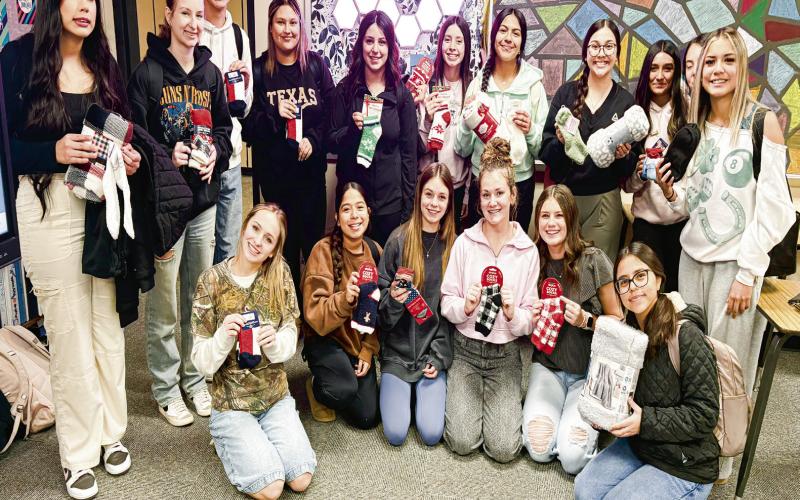 LEVELLAND VOLLEYBALL GIVES BACK - The Levelland High School volleyball program donated socks and blankets to Hickory Terrace Assisted Living last week. Pictured in no particular order is Diana Roman, Azure Wheeler, Bradyn Perez, Evony Vargas, Ava Garza, Jurney Hernandez, Jackie Mercado, Zuriyah Vargas, Katelyn Mendoza, Hayden Almaguer, Darlene Pina, Abigail Heseman, Zaylee Paredez, Hannah Murillo, Lola Potter, Kamryn Navarro and Siomara Ponce.