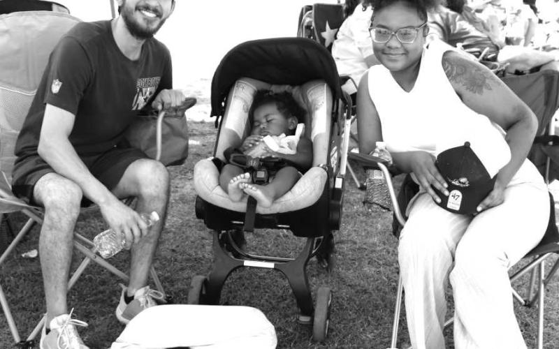 ENJOYINGTHE JAMAICA- Pictured are Alex Perez, Zara Perez and mom Zoe Perez spending quality time together at the Jamaica on Sunday. They watched the volleyball tournament, enjoyed music and other activities at St. Michael’s Catholic Church Jamaica. (Photo courtesy of Emily Campos)