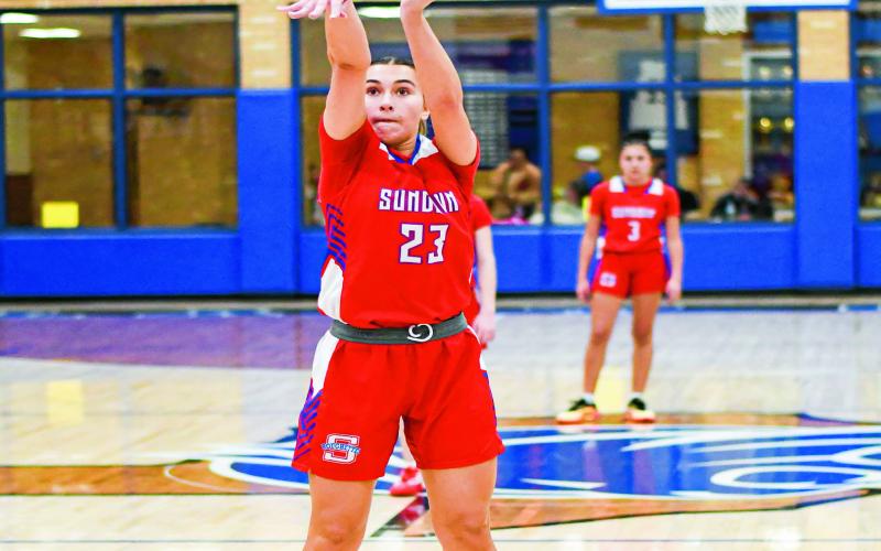 TAGGART AT THE CHARITY STRIPE - Sundown Roughette Kyndal Taggart shoots a free throw during their game against Smyer this past Friday night at Smyer High School. (Staff photo by Jentezen Smith)